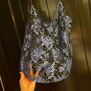 EUC  blue and black netting, slightly longer in the front.